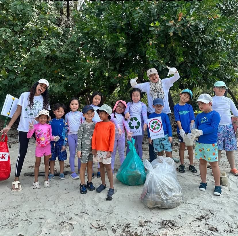 Students taking part in beach activities in Port Dickson